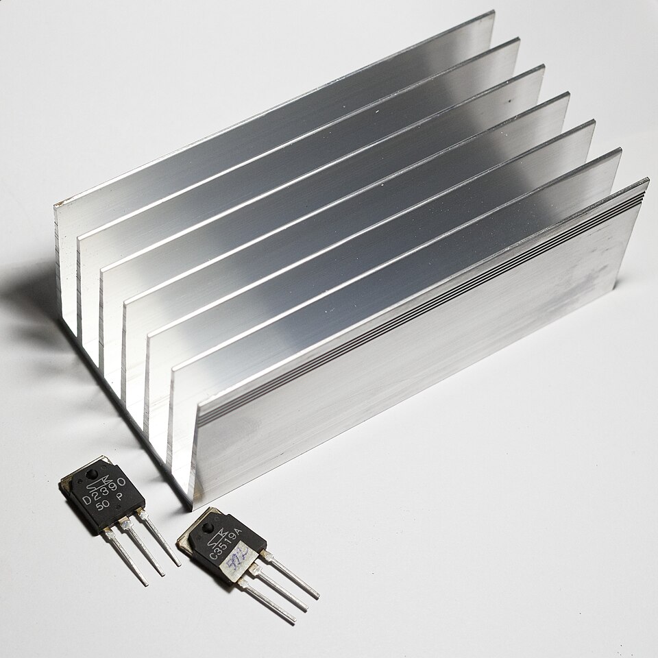 Extruded aluminium heat sink with power transistors