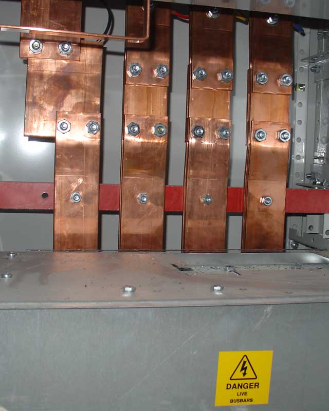 Bolted copper busbars in a switchboard
