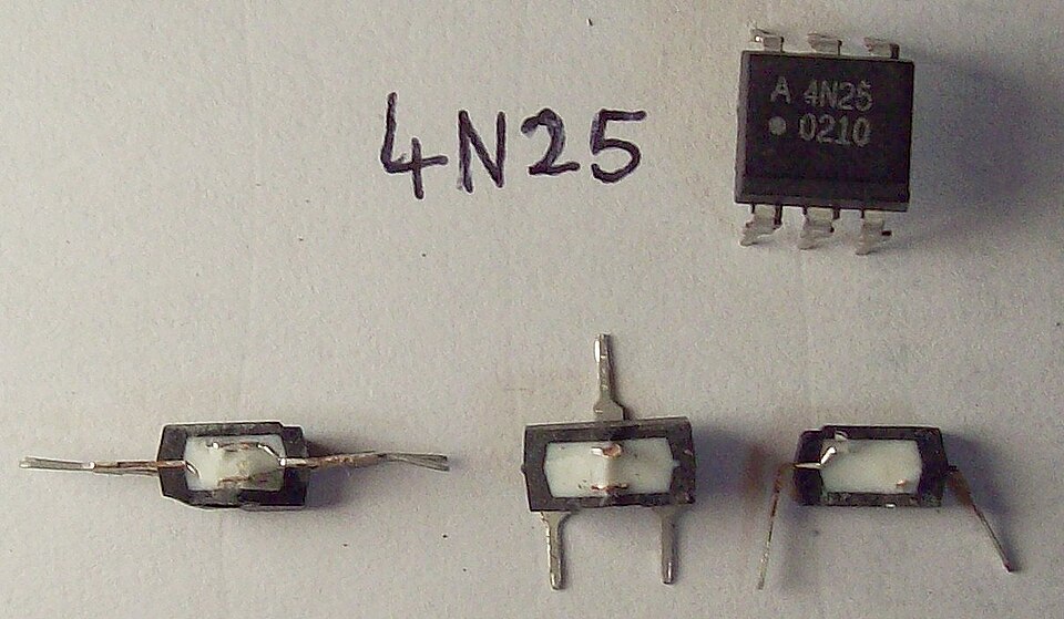 4N25 optocoupler beside its internal parts